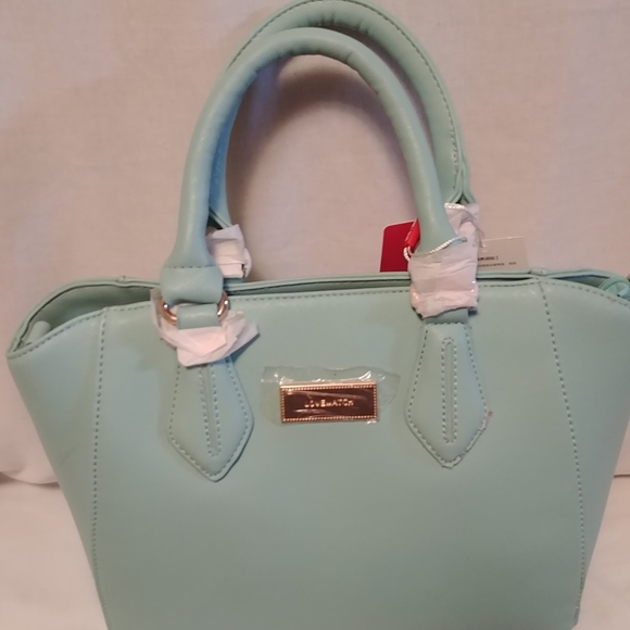 love match Handbags - Love Match handbag